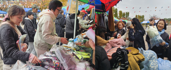 사진. 행사 참가자들이 의류 나눔 부스에서 옷을 고르고 있다.